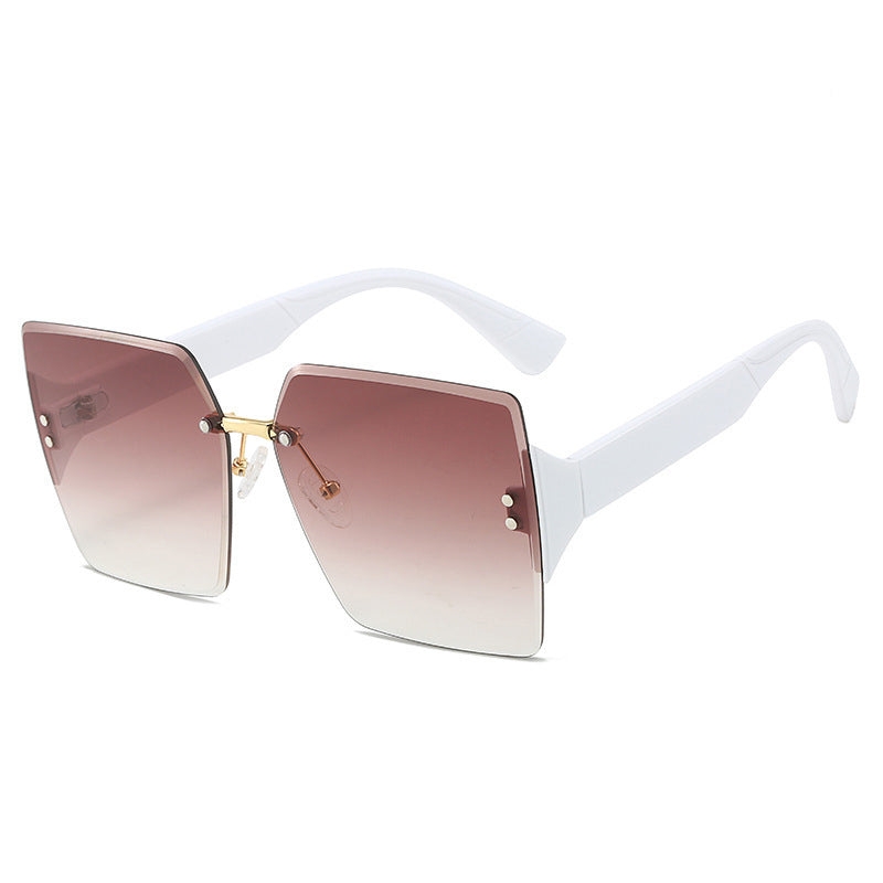 Lunettes de soleil carrées sans monture pour femme